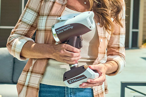 woman holding blower