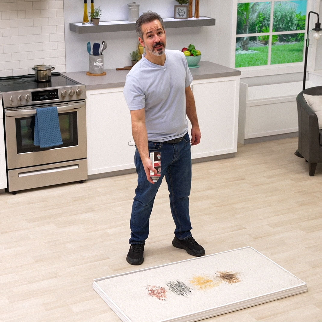 man spraying bull shot carpet