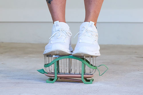 man standing on tidy turtle