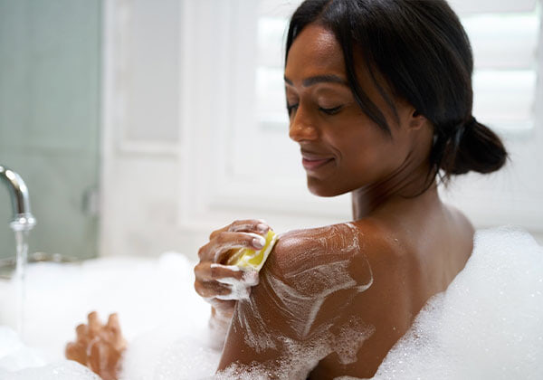 Woman using Glo Nana Soap