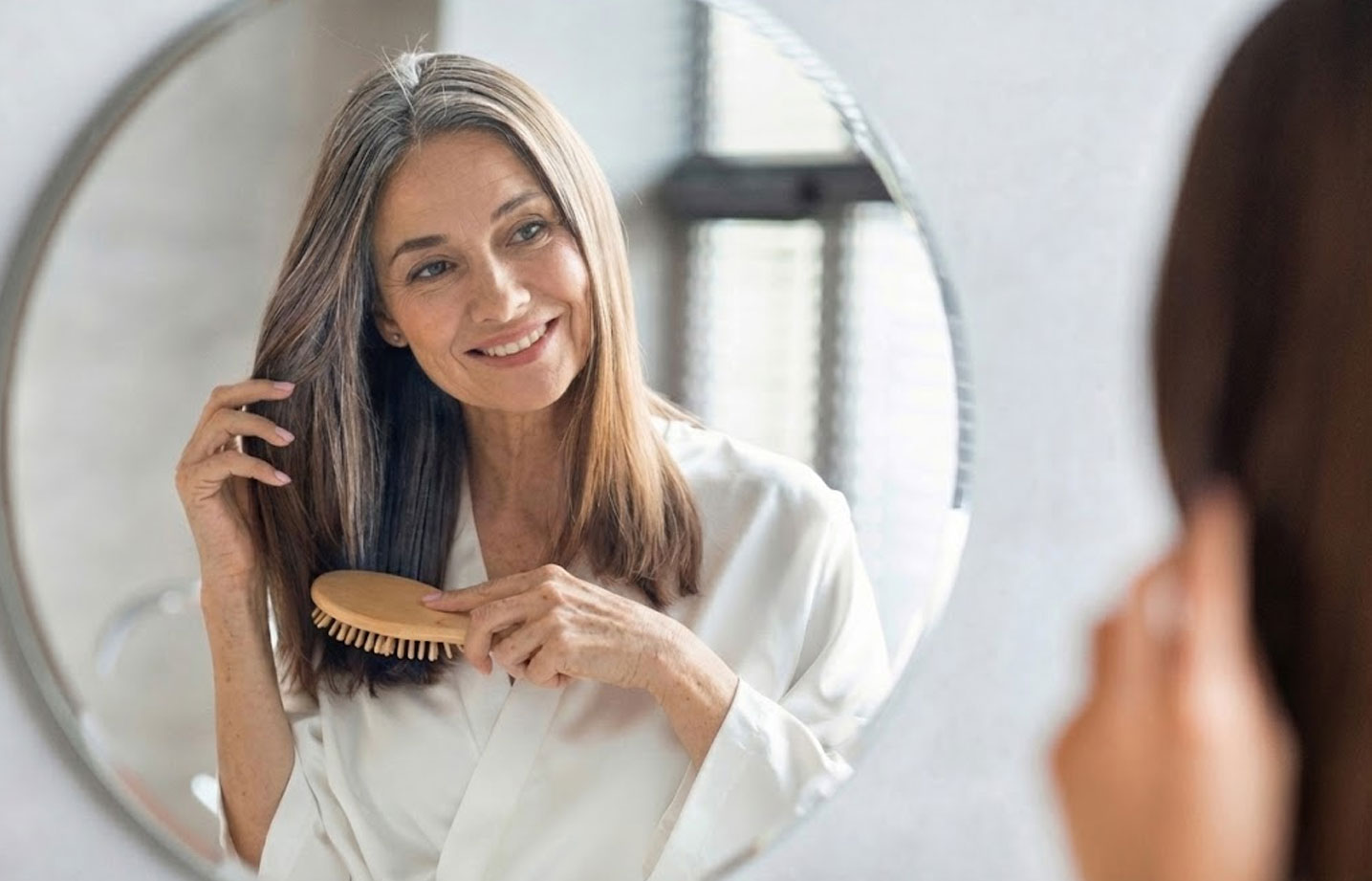 woman brushing hair