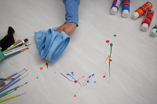 wiping mess on table