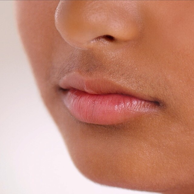 Close up of fine hair on the upper lip before using Sensia