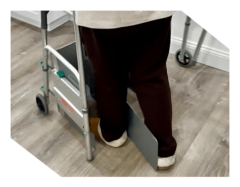 Older lady walking with E-Z Gait