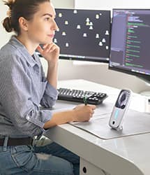 Woman using Arctic Air® Pocket on her desk