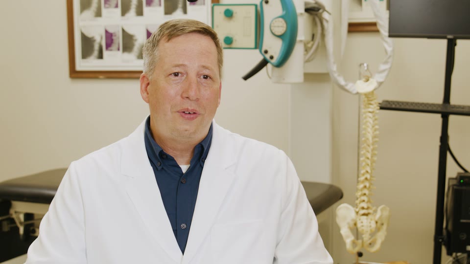 Dr. Charles Simpson, Doctor of Chiropractic, in his office