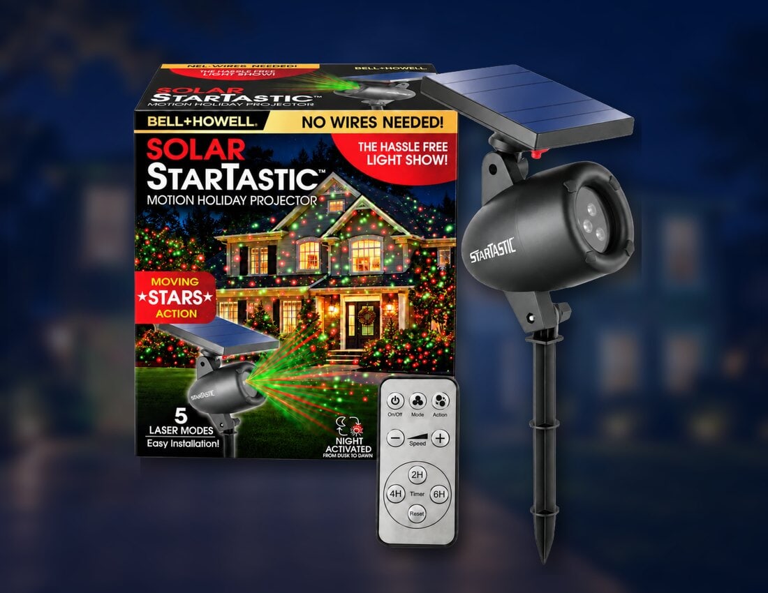 One Startastic solar projector with its box and remote