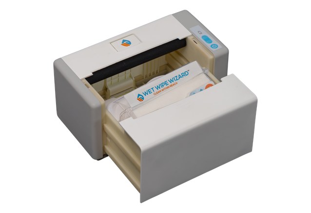 A Wet Wipe Wizard&trade; refill cartridge going into the dispenser
