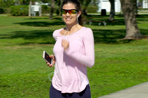 Woman jogging in park wearing Battle Vision